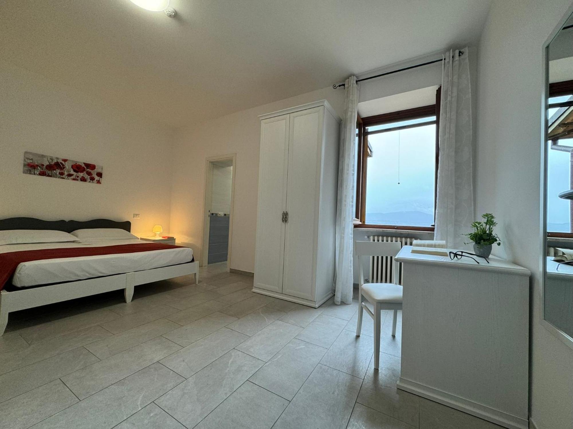 Monastero Ss. Annunziata Hotel Todi Exterior photo A room at the hotel