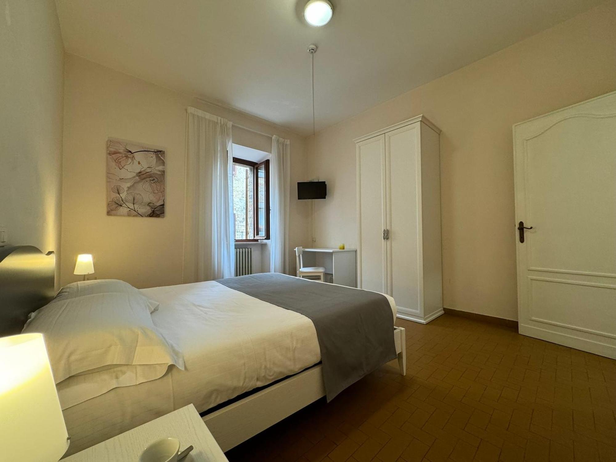 Monastero Ss. Annunziata Hotel Todi Exterior photo A room at the hotel
