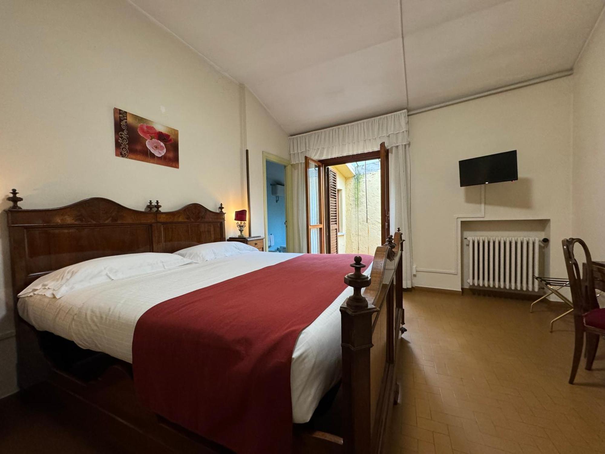 Monastero Ss. Annunziata Hotel Todi Exterior photo A room at the hotel