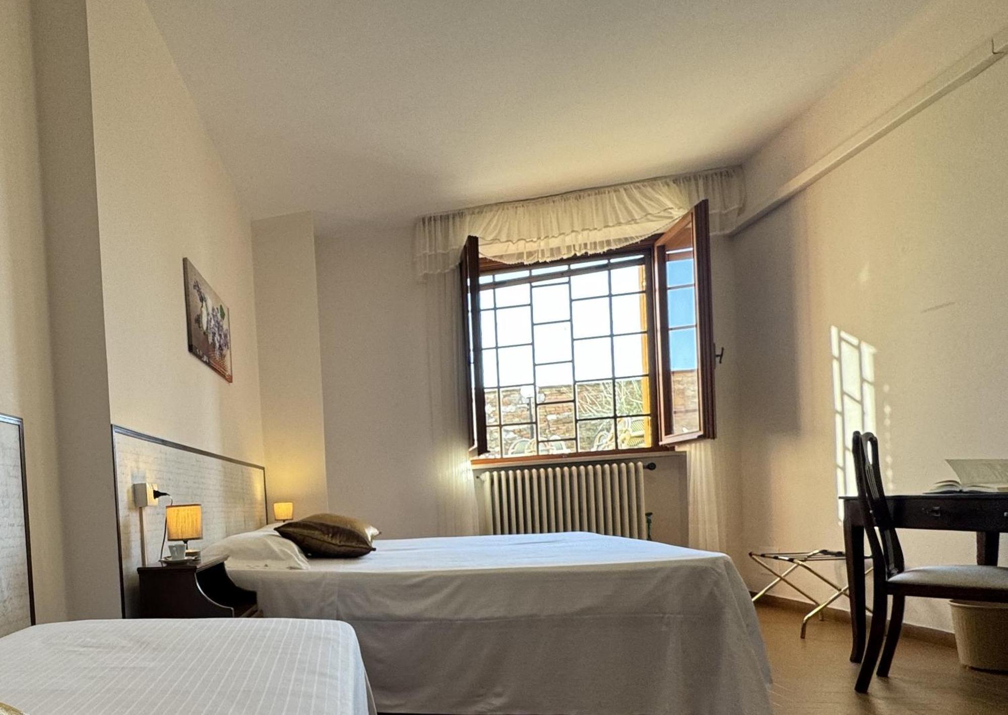 Monastero Ss. Annunziata Hotel Todi Room photo A room at the hotel